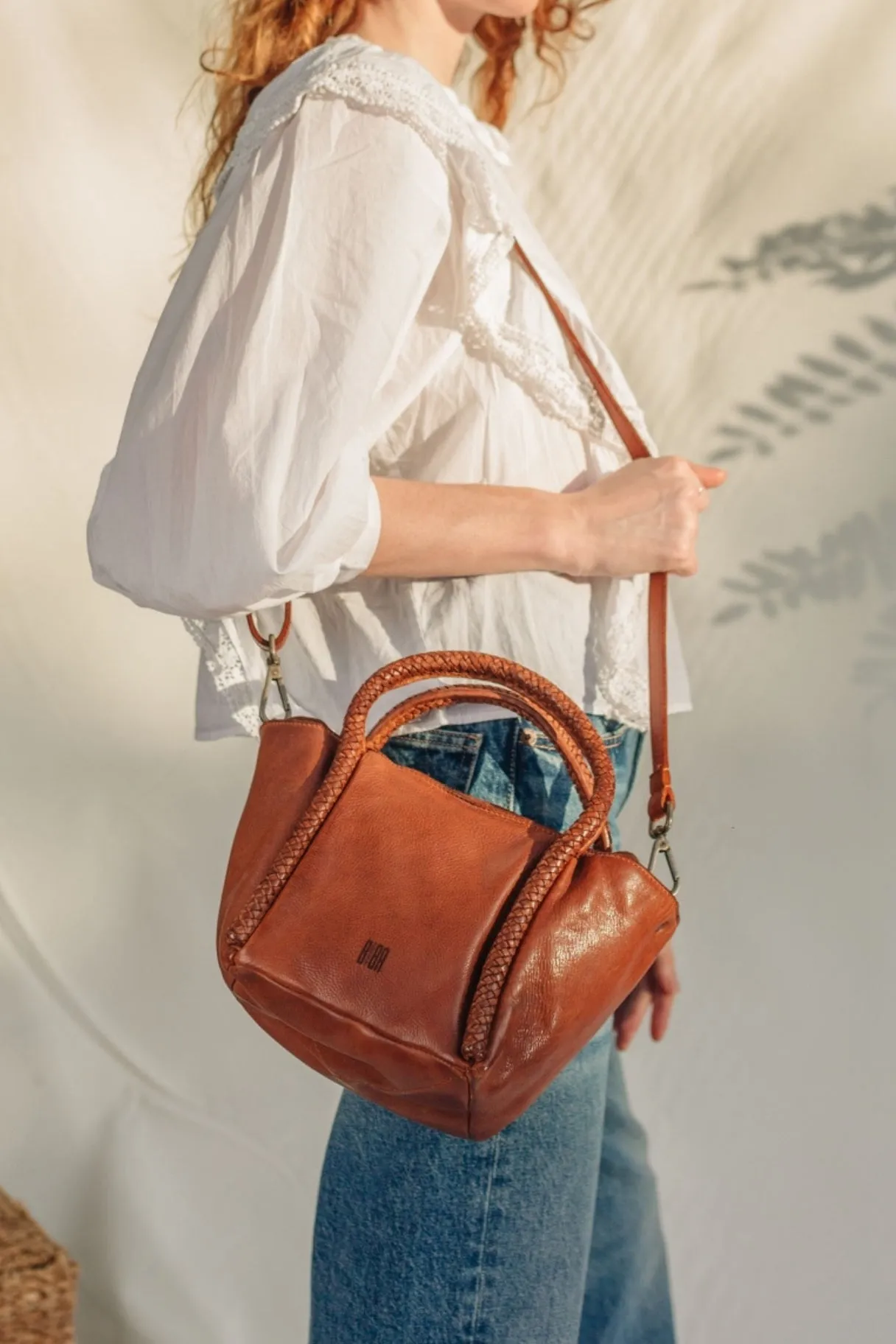 Mini sac en cuir tressé Pullman - légance artisanale et fonctionnalité